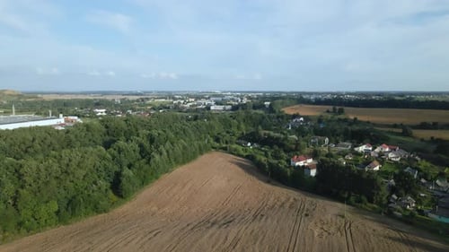 A small village surrounded by agricultural fields.