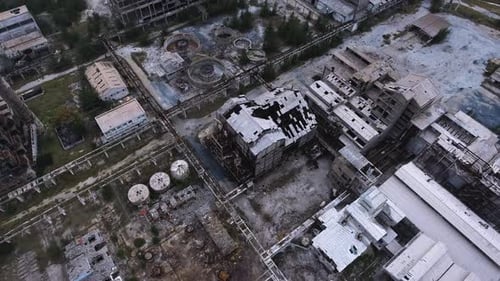 Abandoned Oil refinery factory destroyed in war or earthquake, Aerial top down view