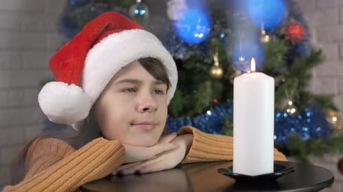 Dreaming Teen Christmas Night with Candle