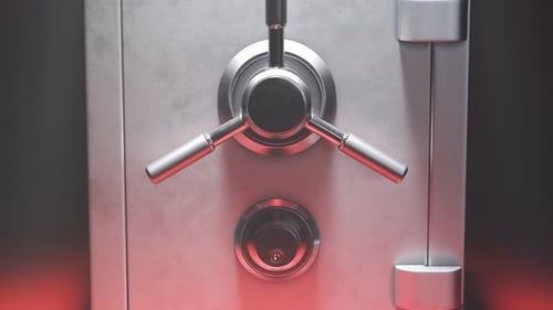 Empty steel safe on a red carpet in the spotlight.Vault doors are slowly opening