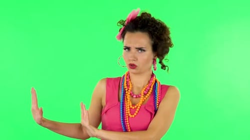 Woman Strictly Gesturing with Hands Shape Meaning Denial Saying NO. Green Screen