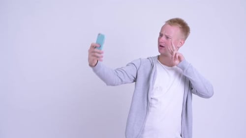 Young Adult Posing for Selfie with Phone