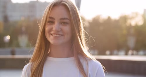 Young Woman Smiling, Golden Hour Portrait