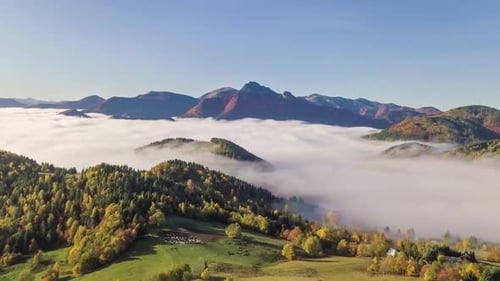 Majestic Aerial View of Mountains with Cloud Inversion