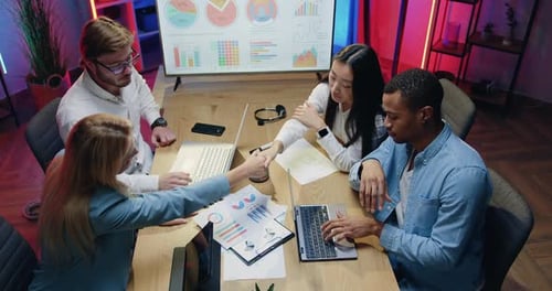 Corporate Team Discussing Business at Meeting