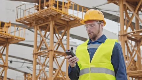 Engineer Inspecting Construction Site