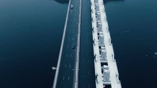 Aerial View, Flying Over the Highway Through the Bay in Snowfall