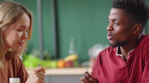 Friends Eating Healthy Salads Together at Home