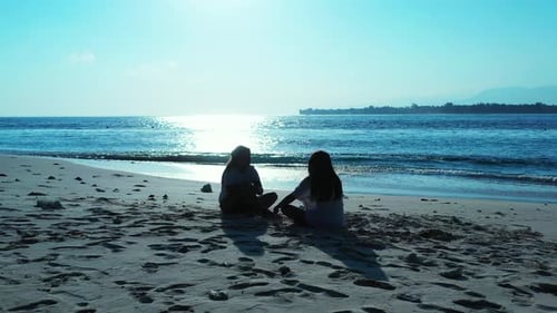 Sexy smiling ladies relaxing enjoying life on beach on paradise white sand and blue 4K background