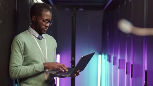 IT Specialist Maintaining Work of Mainframe in Server Room