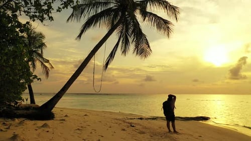 Sexy beauty model on holiday by the sea on beach on clean white sand and blue background 4K