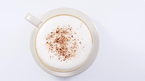 Taza de café con espuma de leche giratoria