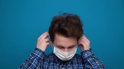 Boy Feeling Sick and Wearing Mask