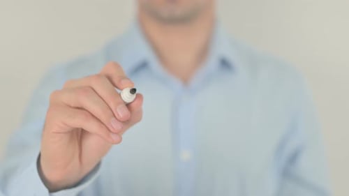 Man Writing the Word Execute with Marker