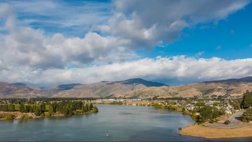 Timelapse of rainbow above river