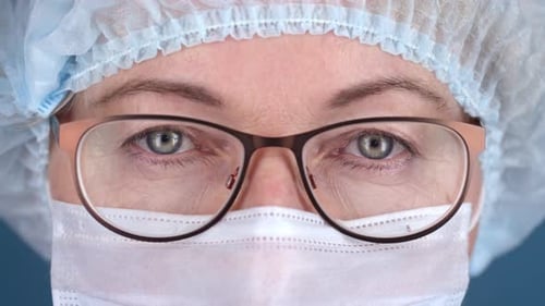 Close Up of Eyes of Female Doctor in Mask