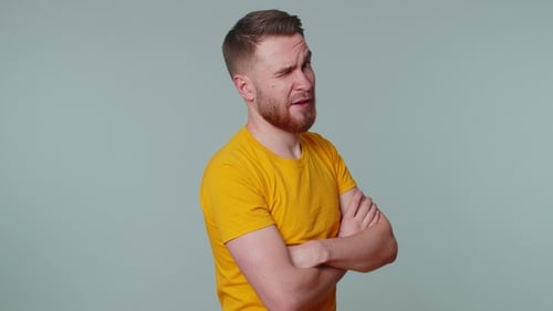 Man Talking and Gesturing Towards the Camera