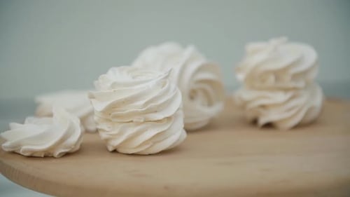 Marshmallows on a Spinning Wooden Table