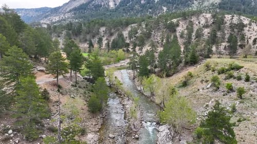 Mountain river high in the mountains aerial view 4 K