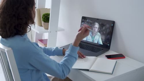 Hispanic Teen School Girl Student Distance Learning Online Lesson on Video Call