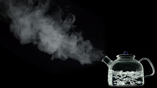 Close Up of Steaming Water in Teapot
