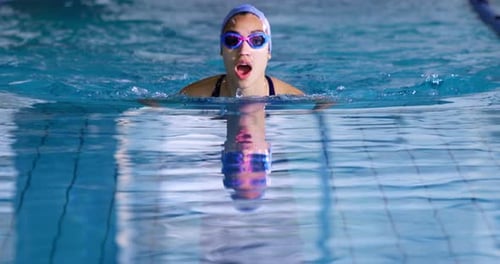 Swimmer training in a swimming pool