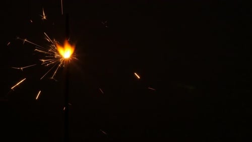 Sparkling Sparkler Lights Up the Dark Night