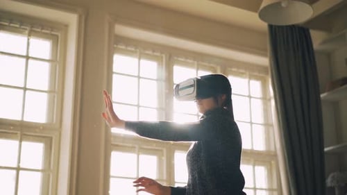 Young Adult Exploring Virtual Reality with VR Headset