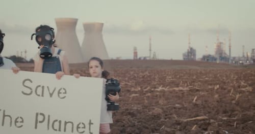 climate change crisis. Kids wearing gas masks near an oil refinery