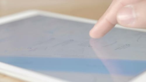 Finger Interacting with Digital Map on Tablet