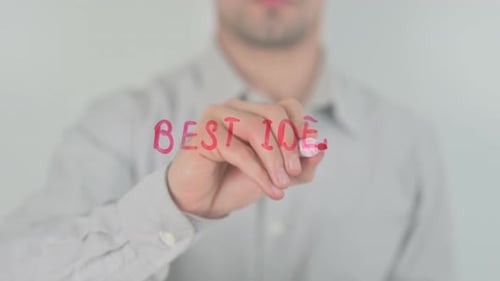 Writing the Words Best Idea on Glass