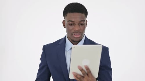 Man Celebrates Using Tablet Device