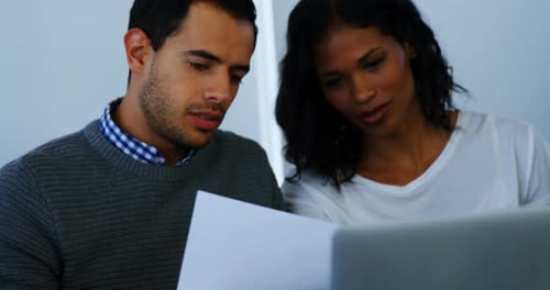 Teamwork Collaboration at Home with a Laptop