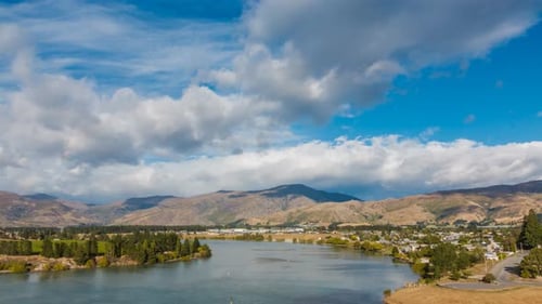 Timelapse of rainbow above river