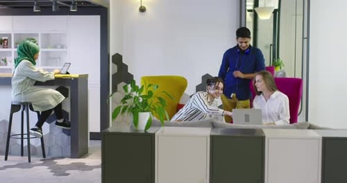 Multiethnic Colleagues in a Modern Startup Company Having Meeting