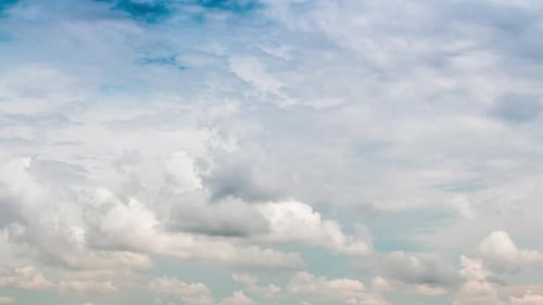 Clouds Moving Slowly Across the Daytime Sky
