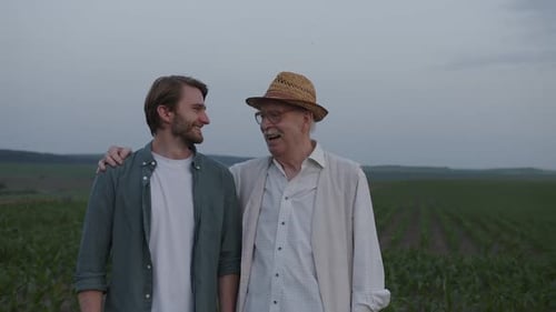 Smiled Two Man Stand and Speak Together