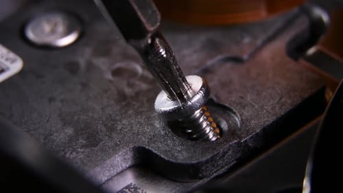 Screw Tightened into Place with Screwdriver Tool