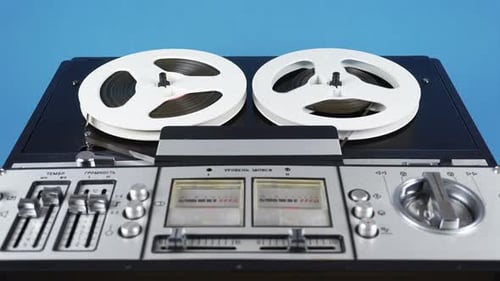 Vintage Reel to Reel Tape Recorder in Operation