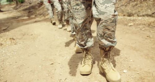 Military troops walking at boot camp
