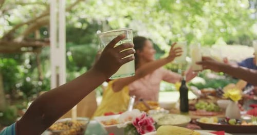 Multi-generation African American family spending time in garden
