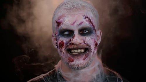 Creepy Zombie with Dramatic Makeup and Smoky Effect
