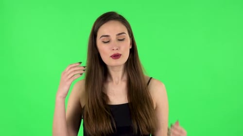 Woman Struggles With Heat on Green Screen