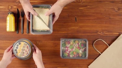 Food Delivery Top View Take Away Meals in Disposable Containers on Wooden Table