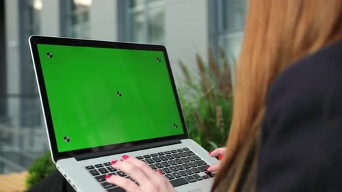 Women Hands Working on Laptop Out of the Office Green Screen