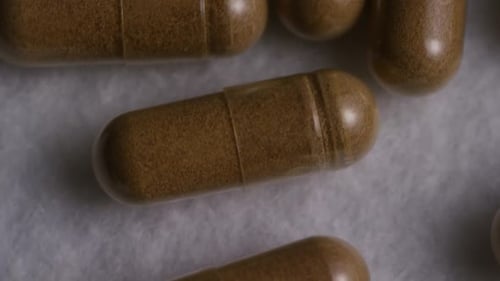 Rotating stock footage shot of vitamins and pills - VITAMINS 0119