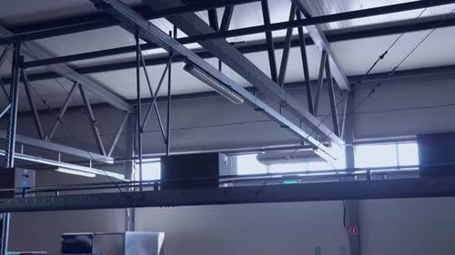 Boxes Moving on Conveyor Belt in Factory