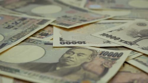 Pile of Japanese 10,000 Yen Banknotes