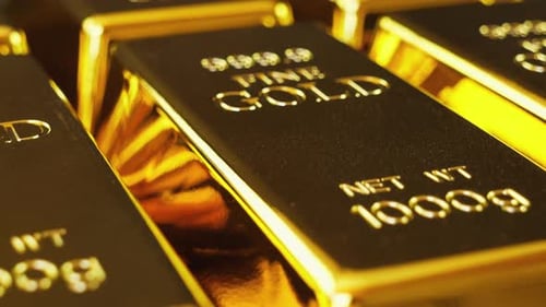 Rows of Shiny Gold Bullion Bars Close Up