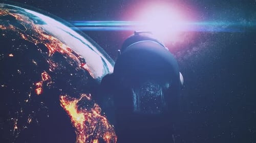 Cosmonaute au-dessus de la planète Terre illuminée et de la lumière du soleil